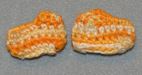 orange%20and%20yellow%20crocheted%20doll%20booties